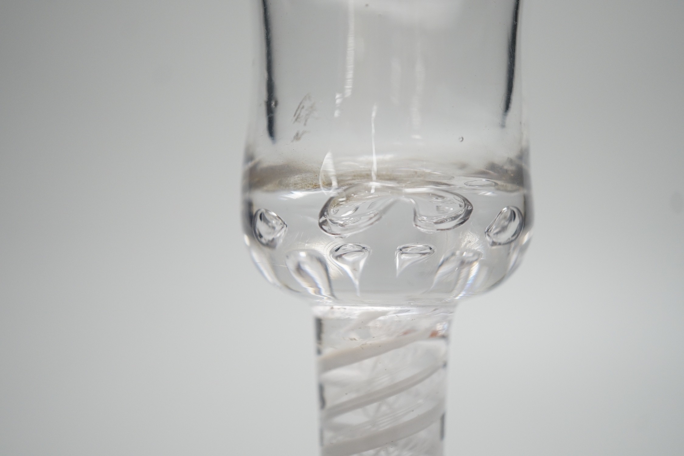 An 18th century Double series opaque twist stem wine glass. 18.5cm tall